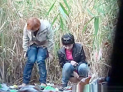 Chubby redhead and brunette chicks spied pissing