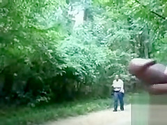Chubby woman is mesmerized by his large cock in public