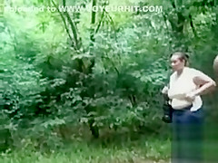 Chubby woman is mesmerized by his large cock in public