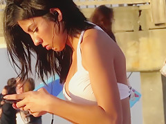 Close up on her tight bikini on the beach! killer ass teen 18+!