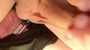 Close-up foreskin cumshot