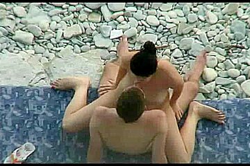 Couple caught having sex on the beach