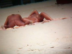 Couple exposing for the at the beach