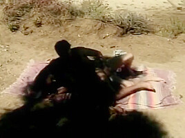 Curly Haired Ebony Slut Sucks Juicy White Dick Before Being Banged In The Desert