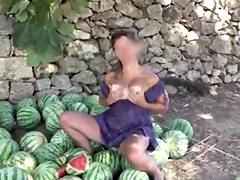 Curvy MILF in public masturbation action with watermelons