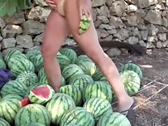 Curvy MILF in public masturbation action with watermelons