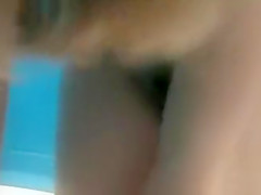 Cute teen 18+ putting on a blue bikini