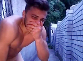 Cutie jacking on the side of the house