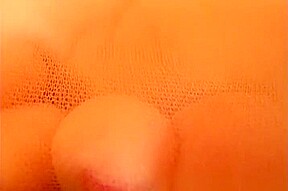 Daisy gives a reverse footjob
