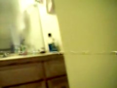 Doll waving her soft booty on hidden shower camera