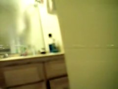 Doll waving her soft booty on hidden shower camera