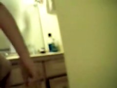 Doll waving her soft booty on hidden shower camera