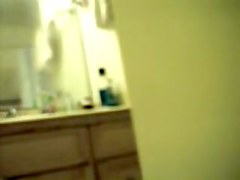 Doll waving her soft booty on hidden shower camera