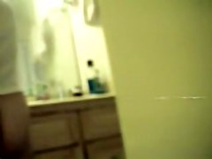 Doll waving her soft booty on hidden shower camera