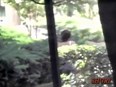 Dreamy Asian brunette loses her top during really fast sharking attack