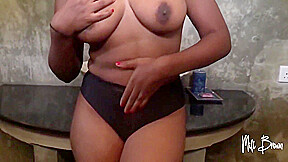 Ebony Beauty Posing In Red Lingerie