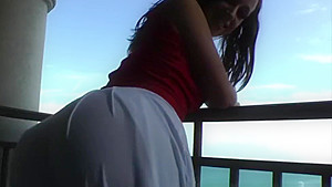 Erotic buttplay at the balcony