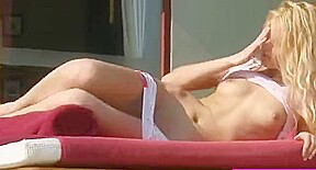 Excellent blond cutie masturbates in the sun