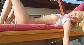 Excellent blond cutie masturbates in the sun