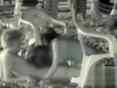 Exhibitionist couple has night time sex on the beach