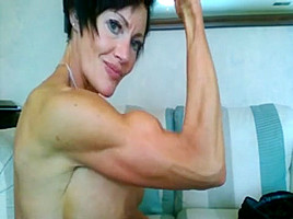 FBB Muscle Milf Stripping Down and Showing off her Huge Tits
