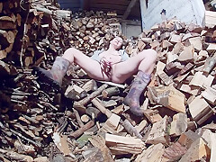 Farmer Wife Masturbates In The Wood Shed