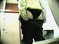Female lost off pants and showed hairy slits on toilet cam