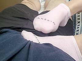 Footjob With Socks Leads To Huge Cumshot On Feet