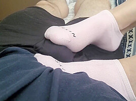 Footjob With Socks Leads To Huge Cumshot On Feet