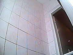Foxy babe's ass spied while she pissed