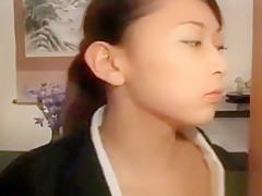 Fragile asian girl blowing two cocks in threesome