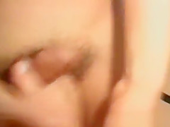 Fragile asian girl blowing two cocks in threesome