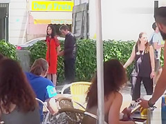 Gagged brunette tormented in public bar