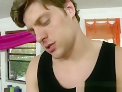 Gay prepares a clients ass with a dildo