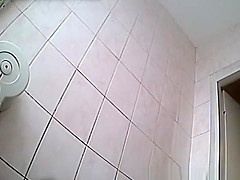 Gir in yellow t-shirt peeing