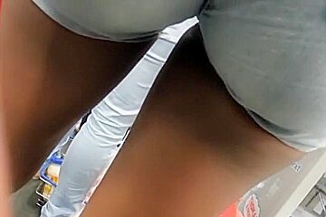Girl in tight jeans shorts
