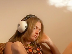 Girl masturbates and listens to music