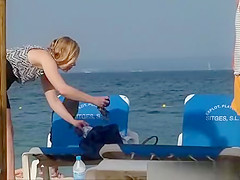 Girl on the beach dresses pants