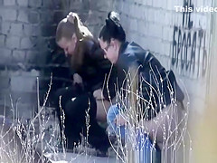 Girls peeing abandon place