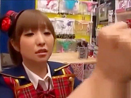 Giving Handjob On Her Knees Cum To Palm In The Sexshop