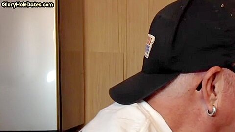 Gloryhole homemade DILF sucks cock in home closeup scene