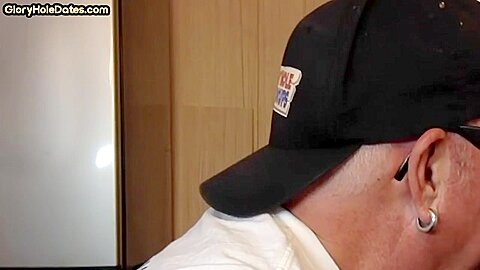 Gloryhole homemade DILF sucks cock in home closeup scene