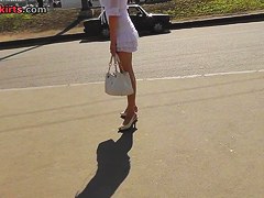 Golden-Haired legal age teenager 18+ wears a short short petticoat