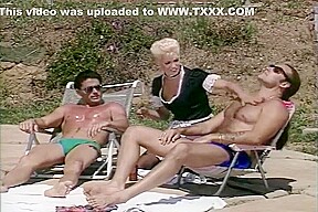 Horny Blonde Maid Helps These Suntanning Dudes Oil Up
