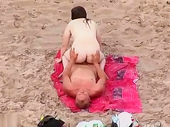 Horny matures caught at the nude beach