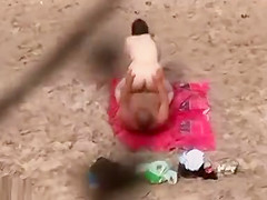 Horny matures caught at the nude beach