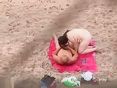 Horny matures caught at the nude beach