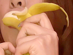 Hot And Sexy Redhead Playing With A Hard Banana On