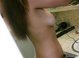Hot Brunette with big tits wearing lingerie