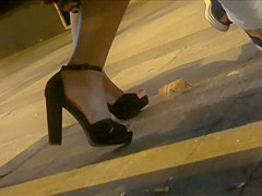 Hot Feet In High Heels Under A Bench